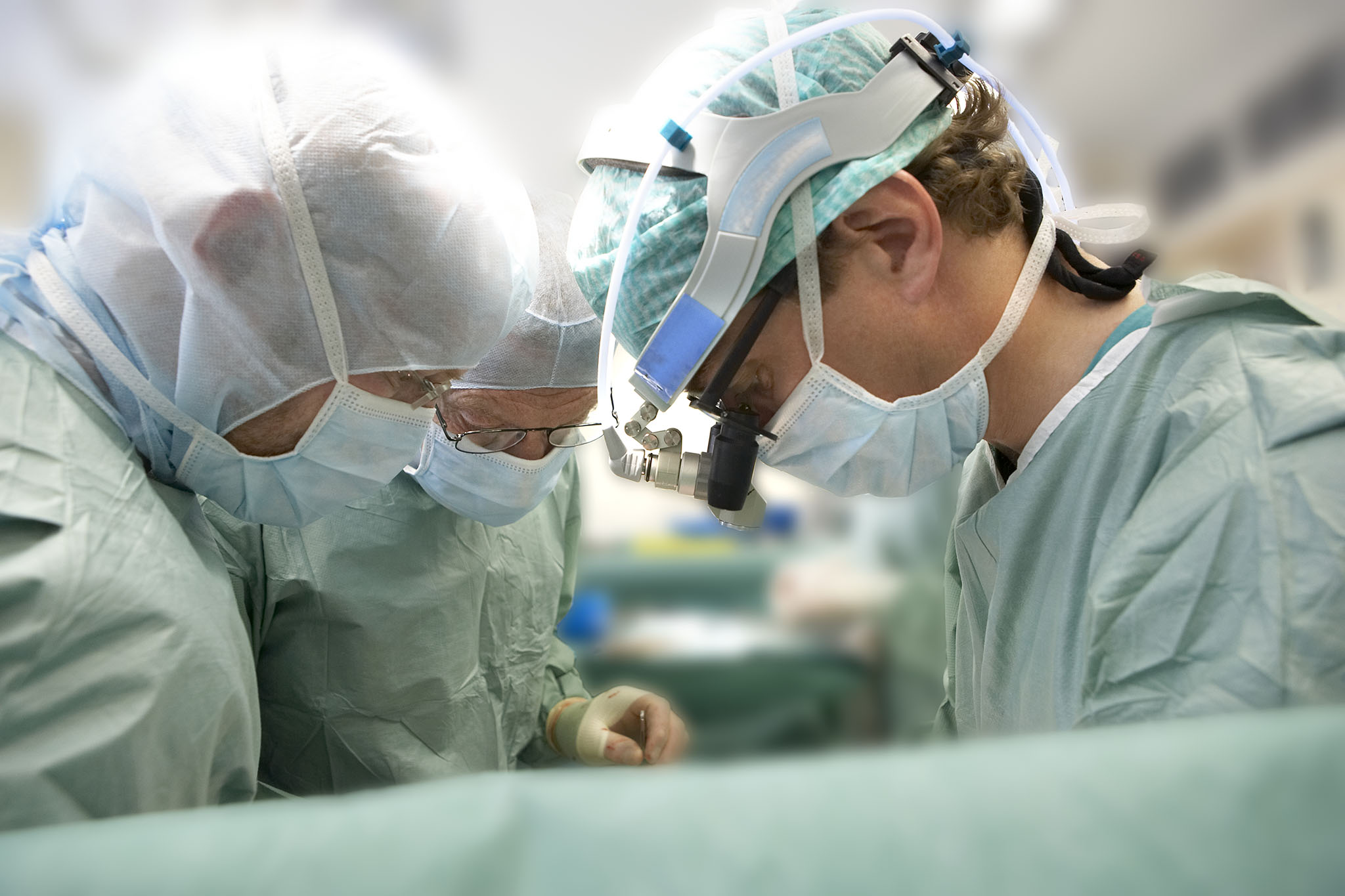 doctors performing surgery